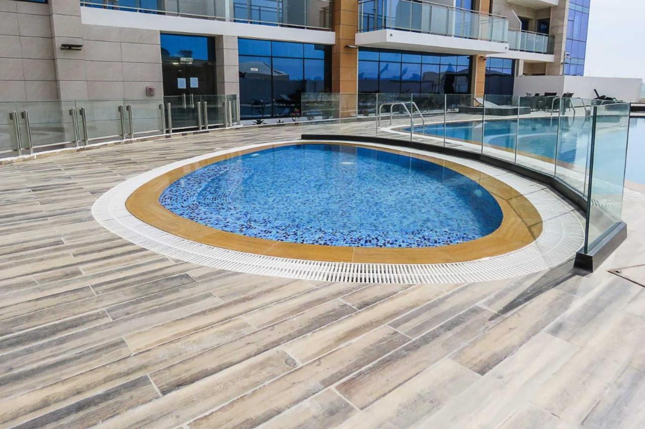 Oyo 860 Studio Apartment, Maya Tower 4, Jumeirah Village Triangle Dubai Exterior photo